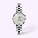 Tissot Watches Desir T1522231103600 silver-tone watch featuring a textured white dial, diamond hour markers, a moon phase display, and a date window.