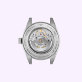 The Tissot Watches Gentleman 38mm T1658071109100 reveals its Swiss automatic movement through a transparent sapphire crystal caseback, highlighting visible gears and intricate engravings.