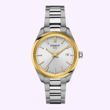 The Tissot Watches PR 100 34mm T1502102103100 by Tissot Watches is a striking two-tone silver and gold wristwatch featuring a white dial, gold hour markers, and a date window at the 3 o’clock position. Displayed on a pale lavender background, this sleek Swiss Quartz timepiece embodies both sophistication and accuracy.