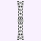 A silver metal watch band with an engraved TISSOT 1853 clasp, designed for the Tissot Watches PR516 38mm T1494071103100 Swiss automatic watch by Tissot Watches, featuring Powermatic 80 movement, displayed vertically against a light purple background.