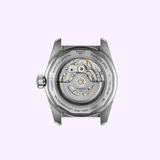 Back view of the Tissot Watches PR516 38mm T1494071103100, featuring an exposed Powermatic 80 mechanical movement visible through a transparent case back, with intricate gears and stainless steel casing by Tissot Watches.
