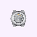 The stainless steel case back of a Tissot Watches PRX 40mm T1374071111100 wristwatch, featuring an exhibition window revealing the automatic movement inside.