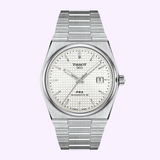 Silver-tone Tissot Watches PRX 40mm T1374071111100 watch with a white waffle-patterned dial, silver hour markers, and an integrated link bracelet.