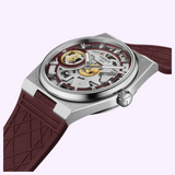 Tissot Watches PRX T1374051737100 Skeleton Damian Lillard Special Edition watch featuring a silver tonneau case, maroon rubber strap, and exposed gold gears on the dial.