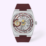 Tissot Watches PRX T1374051737100 Skeleton Damian Lillard Special Edition watch with a silver tonneau-shaped case, a maroon rubber strap, and a dial featuring a gold basketball-shaped balance wheel and the text DAME TIME.