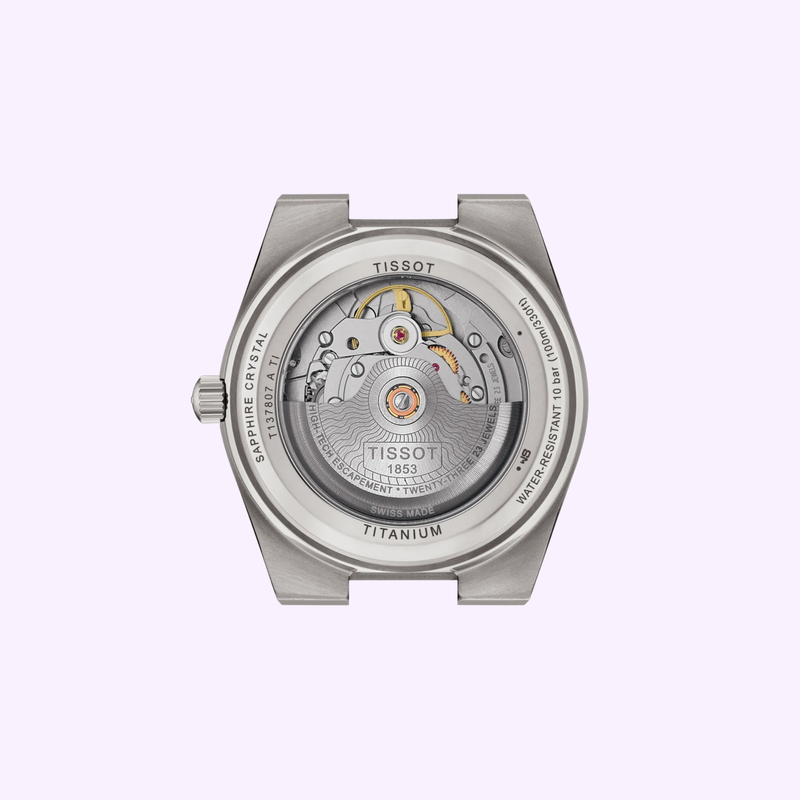 Tissot PRX Titanium 38mm T1378074406100 shown at an angle highlighting the satin-brushed titanium finish