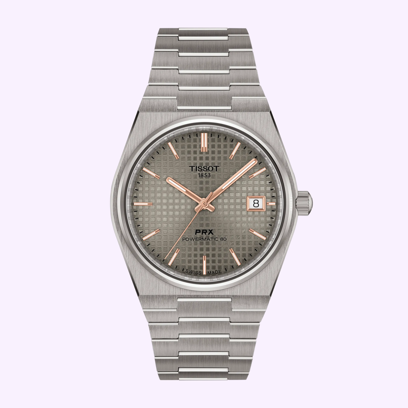 Tissot PRX Titanium 38mm T137.807.44.061.00 with anthracite waffle-pattern dial, rose-gold accents, and integrated titanium bracelet, front view