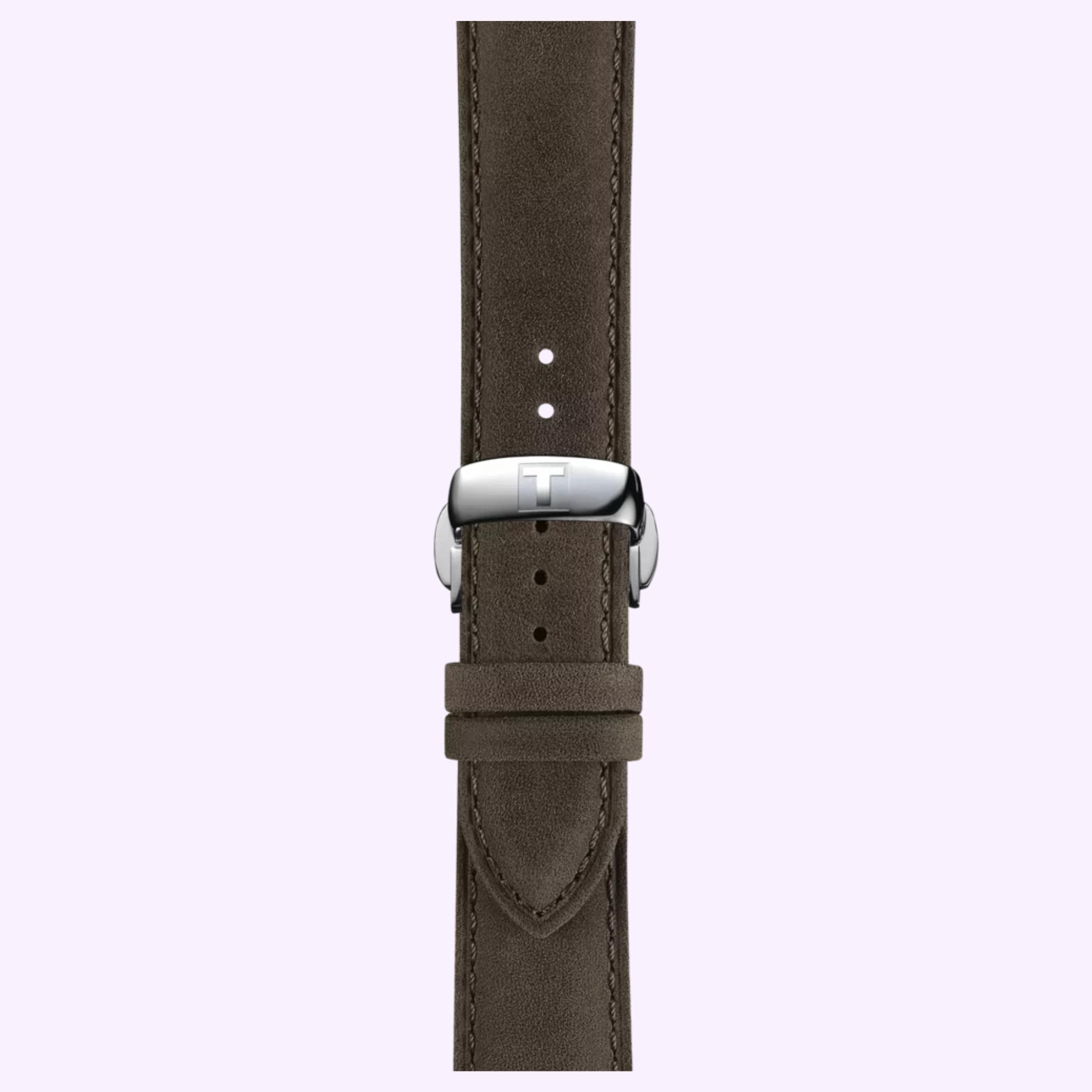 A brown leather watch strap with a silver buckle, engraved with a T to reflect the signature detail of the Tissot Watches Seastar Chemin Des Tourelles Skeleton 39mm (T1398361626100), is shown from above on a light purple background, with extra holes visible along the strap.