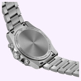 Close-up of the back of a Tissot Watches Supersport Chrono 42mm T1254171135100, featuring a stainless steel case and metal strap, with engraved details indicating water resistance, crystal type, and the Tissot Watches brand—characteristic of the Supersport Chrono collection’s signature 42mm chronograph design.