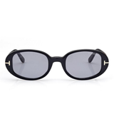 Tom Ford Sunglasses FT1364/s 4901A (UPC 889214643322) feature black oval frames with dark gray lenses, thick temples, and a signature white “T” detail on each side. Inspired by Miami flair, these standout Tom Ford sunglasses are showcased against a plain white background.