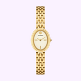 The Tory Burch Watches THE OVAL TBW6032 women's watch features a gold-tone case, oval white dial with minimal hour markers, and link bracelet. The brand name is elegantly displayed on the face against a light lavender background.