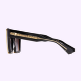 Side view of black Valentino V-GRACE VLS-126A-54 Unisex Sunglasses featuring gold stud detailing along the temples.