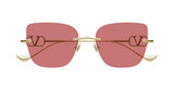 Front view of Valentino Sunglasses VG0033S 004 in gold-gold-red, featuring gold frames, square red-tinted lenses, and “V” logo accents. Crafted in Italy, these luxury sunglasses have sleek curved temples for a modern look.