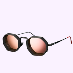 The Vysen Boby B-2 Unisex Sunglasses by Vysen Sunglasses feature bold black octagonal frames, pink-tinted lenses, slim black arms, and red-tipped ends, shown on a light background.