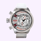 A Welder Watches 700 K38 Oversize Chronograph Unisex Watch by Lexor Miami featuring a silver case, white strap, multiple dials with red accents, and prominent crown buttons, showcasing a modern industrial design.