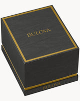 A black box with gold trim and Bulova Watches logo in gold lettering—stylish packaging for the Bulova 97P172 Gold Stainless Steel Strap Lady Watch, shown against a white background.