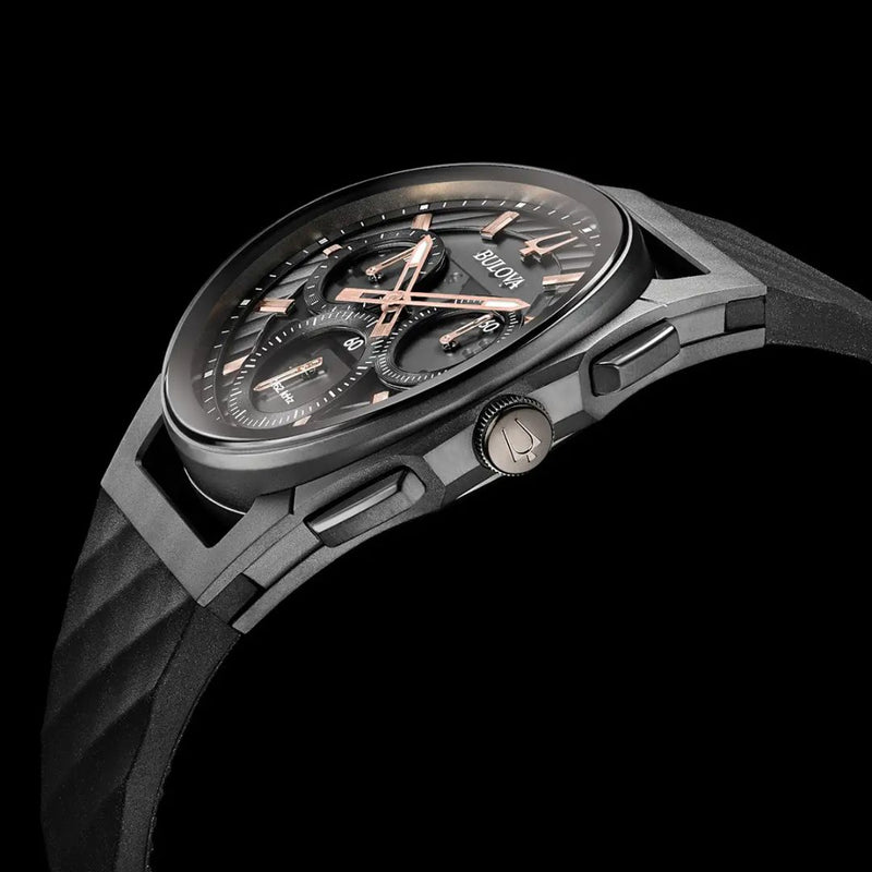 Bulova 98A162 CURV men's chronograph with black dial, rose-gold hands and hour markers and a textured black rubber strap