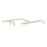 Cartier Optical Frames CT0581O-007 featuring rimless rectangular lenses, gold hinges, and translucent marbled cream temples.
