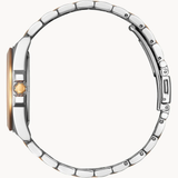 Side view of the Citizen Watches EO1226-59X Peyten women’s luxury watch, featuring a two-tone stainless steel design with gold-accented crown and clasp, highlighting the intricate band links and the watch’s slim profile.