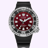 Discover the Citizen Watches Promaster Dive E365 BN1024-01Z—an Eco-Drive diver’s watch from Citizen Watches featuring a vivid red dial, standout white markers, a sleek black rotating bezel, and a durable black rubber strap. With its 200-meter water resistance boldly displayed on the face, this professional-grade timepiece is perfect for underwater adventures.