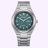 Introducing the Citizen Watches Zenshin Three-hand AW0130-85X: a men’s titanium watch featuring a textured green dial, silver hour markers, and a day-date display at the 3 o’clock position. This sophisticated timepiece from Citizen Watches boasts a brushed silver titanium bracelet and utilizes innovative Eco-Drive technology for reliable, sustainable performance.