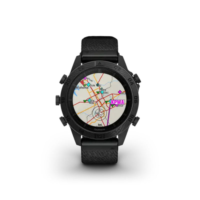 Garmin MARQ Commander Gen 2 Carbon showing an aviation navigation map with airport markers on the AMOLED display