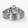 The Hamilton Watches Khaki Field King Day-Date 40mm H64475140 features a stainless steel case, an open case back showing the movement, and a logo-engraved metal bracelet and clasp—ideal for Miami style.