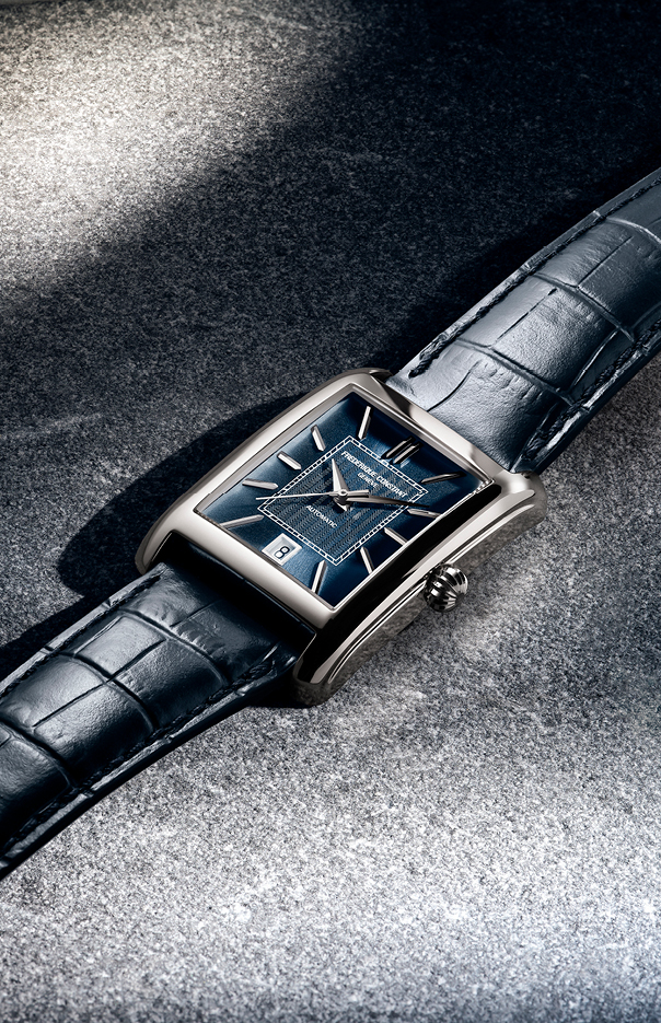 Close-up of the Frederique Constant FC-303N4C26 blue textured dial with silver hour markers and moon phase display