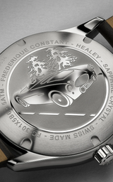 The Frederique Constant Vintage Rally Healey Automatic FC-301HGRS5B26 features a back engraved with a vintage car on a tree-lined road, echoing its racing green dial. Surrounding engravings include Frederique Constant, Healey, and Swiss Made.