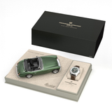 The Frederique Constant Vintage Rally Healey Automatic FC-301HGRS5B26 gift set features an automatic men’s watch with a racing green dial and a Healey model car, elegantly displayed in beige and black Frederique Constant boxes.