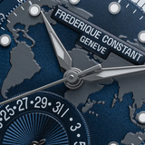 Close-up of the Frederique Constant Manufacture Classic Worldtimer FC-718NWM4H6, a Swiss automatic watch displaying a world map, silver hands, and time zones; date dial partially seen in the lower left.