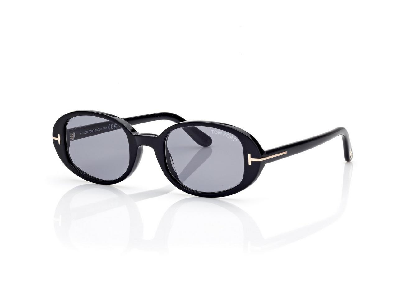 Tom Ford Sunglasses FT1364/S 52N in black feature dark oval lenses, signature gold T accents on the temples, and a Tom Ford logo detail, capturing Miami chic style against a white background.