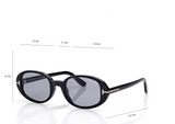 Tom Ford Sunglasses FT1364/S 52N are black oval frames with dark lenses, gold temple accents, and the Tom Ford name on the upper lens. Lens width, bridge width, lens height, and temple length are shown in millimeters.