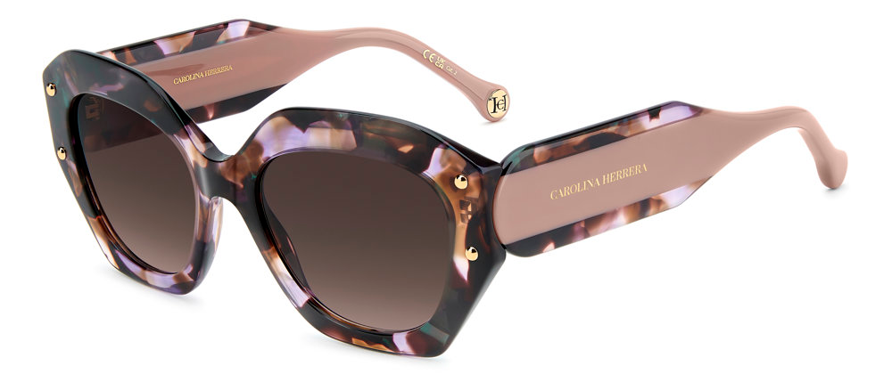 Carolina Herrera Optical Frames HER 0365/S S3 HA BROWN SHADED from the Carolina Herrera Sunglasses collection feature a cat-eye shape, brown shaded lenses, tortoiseshell and blush pink frame, gold accents, and CAROLINA HERRERA on the temples.