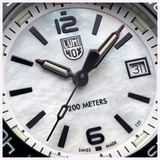 Luminox Pacific Diver Ripple XS.3126M.1 on wrist lifestyle shot Miami ocean background 200m water resistant dive watch