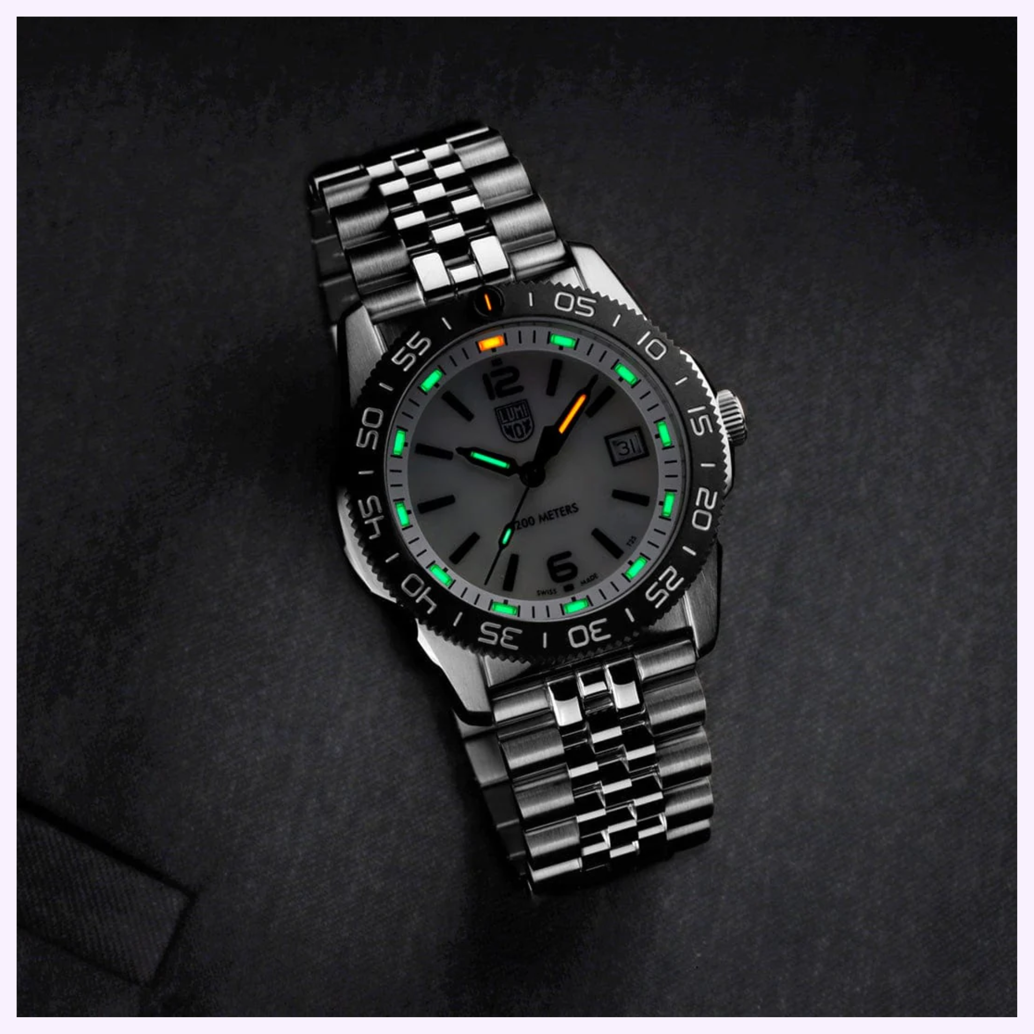 Luminox XS.3126M.1 mother-of-pearl dial close-up with tritium LLT gas tubes and Swiss quartz movement