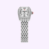 The Michele Watches Special Edition Coquette Diamond Stainless Steel MWW08B000285 by Michele Watches is a luxury timepiece featuring a diamond-studded bezel, a rectangular face, and a sleek stainless steel link bracelet, beautifully showcased against a light purple background.