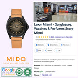 A Mido Watches Multifort TV Big Date M0495263608100 Swiss automatic watch with a brown strap is displayed next to a Google business listing for Lexor Miami—a top-rated store specializing in sunglasses and watches—showcasing its address, hours, and interior. Authenticity and rating badges appear below, emphasizing features such as the advanced Caliber 80 movement.