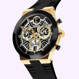 Introducing the Movado Watches BOLD Fusion Chronograph 3601307—a luxury men’s timepiece by Movado Watches, featuring a striking gold and black case, a sleek black strap, and multiple gold-accented subdials for day, date, and 24-hour time on a skeletonized face, all driven by precise Swiss quartz movement.