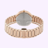 The Movado 3601089 BOLD Horizon by Movado Watches is shown from the back, featuring its elegant rose gold metallic link bracelet and minimalist design against a light purple background.