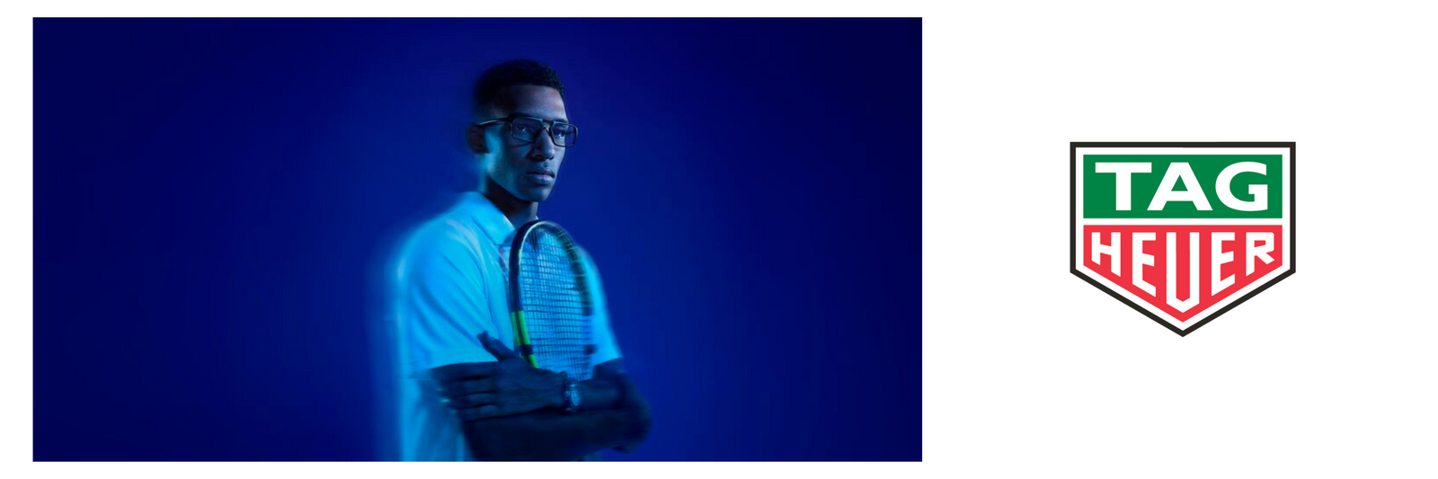 A man in glasses holds a tennis racquet across his chest, posing against a blue background. The TAG Heuer logo is displayed on the right side of the image.