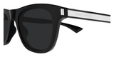 Close-up of Saint Laurent Sunglasses SL879-001 51 featuring thick black frames, dark lenses, and a silver metallic detail on the side arm engraved with the brand name—a timeless luxury accessory.