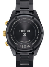 Back of a black Seiko Luxe Watches 100th Anniversary SPEEDTIMER Limited Edition SSH169 GPS Solar watch, showing engraved details such as brand name, serial number, gold buttons, water resistance, sapphire crystal, and stainless steel info.