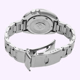 A Seiko Luxe Watches PROSPEX 1970 HERITAGE DIVER’S SAVE THE OCEAN SPECIAL EDITION SPB301 stainless steel watch with an open clasp reveals the engraved case back details. The Save the Ocean Special Edition timepiece is shown against a light purple background.