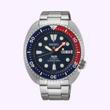 Seiko SRPE99 Prospex PADI Special Edition automatic diver watch with blue dial and red-blue rotating bezel.