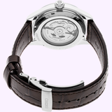 A close-up view of the back of the Seiko Luxe Watches Presage Green Enamel Limited Edition SPB111 for men, featuring a brown leather strap and highlighting the transparent case back with visible automatic movement inside.
