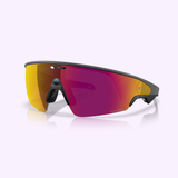 A pair of Oakley Meta Vanguard Sunglasses 0OW8001 800109 from Oakley Meta Sunglasses, featuring a single wraparound lens with a yellow-to-pink gradient tint and black frame, shown on a light purple background.