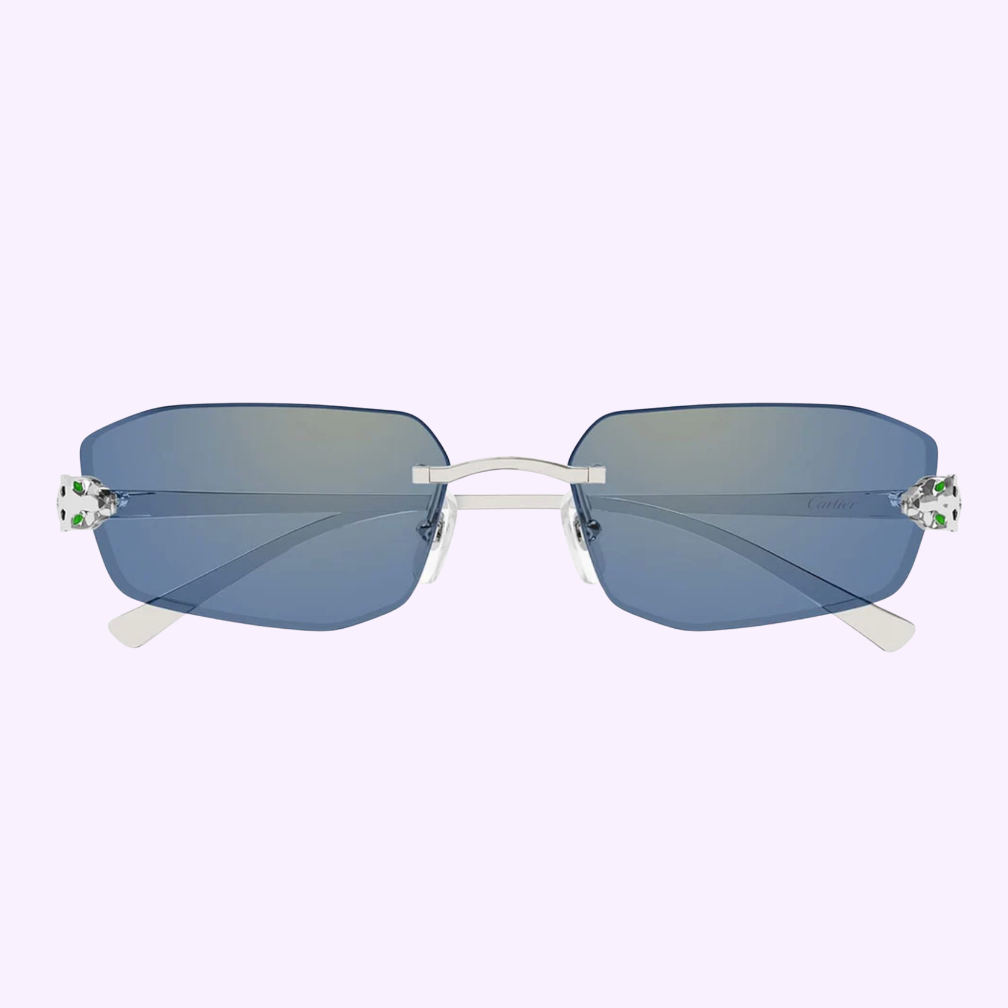 Cartier Sunglasses CT0474S-005 UNISEX feature rimless rectangular blue-tinted lenses, thin silver bridge and arms, and green and white hinge accents, shown on a pale lavender background.