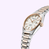 The Frederique Constant Highlife Automatic COSC FC-303V4NH2B features a silver and rose gold metal band, white globe-pattern dial, gold markers and hands, date display, and Frederique Constant branding on the face.