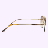 A side view of Carrera 1016/S J5G 64 unisex sunglasses by Carrera Sunglasses, featuring thin gold metal arms and brown tips, set against a light purple background. UPC: 716736126999.